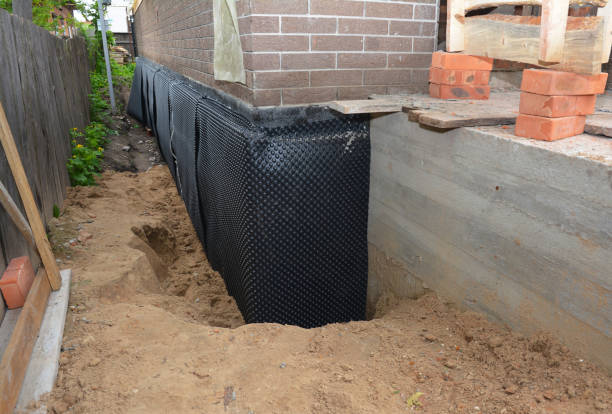 SJ Waterproofing Pros technician performing targeted Basement Waterproofing assessment in Silverdale, PA